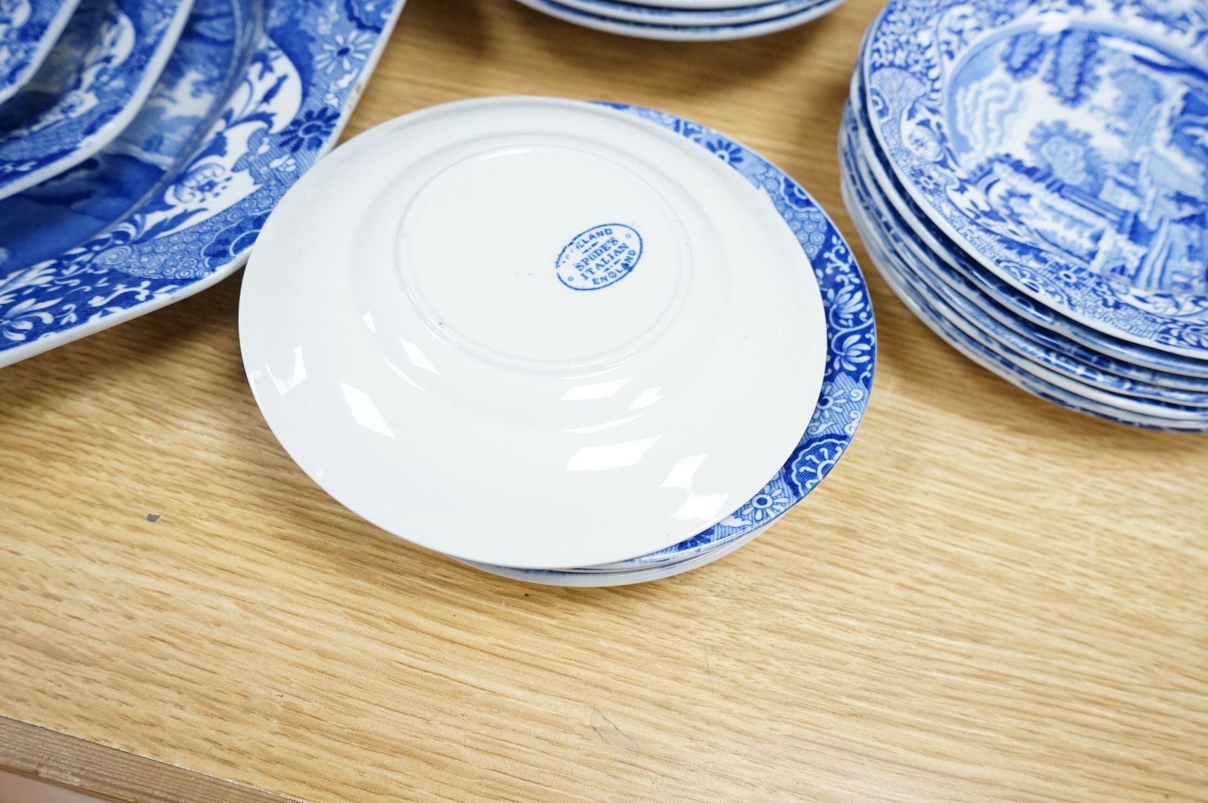 A Spode blue and white Italian service to include dinner plates, graduated bowls and platters, largest 37cm wide